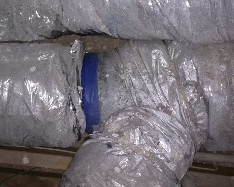 Blue masking tape used to "seal" a new duct installation